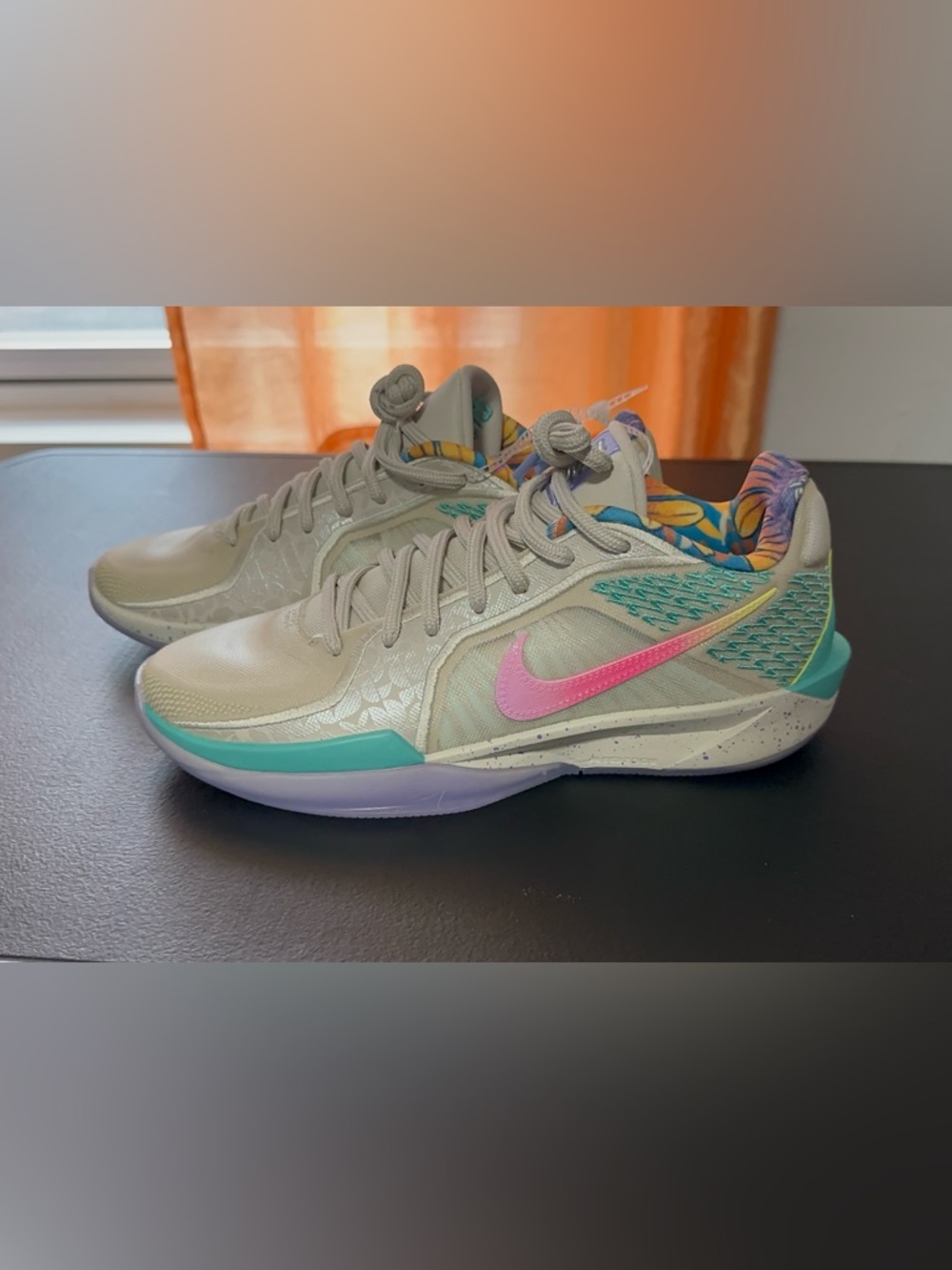 Nike Women's Low-Top Sneakers in Light Gray with Pink Swoosh and Teal Accents